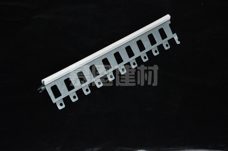 Slotted metal profile for protecting and finishing corners